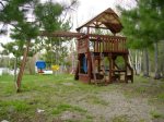 Play set right outside front of cabin